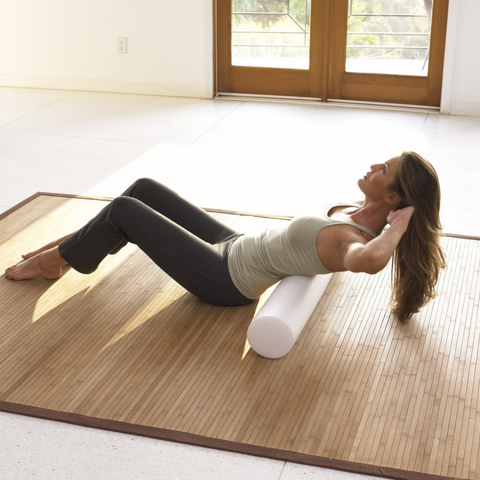 Woman using a foam roller