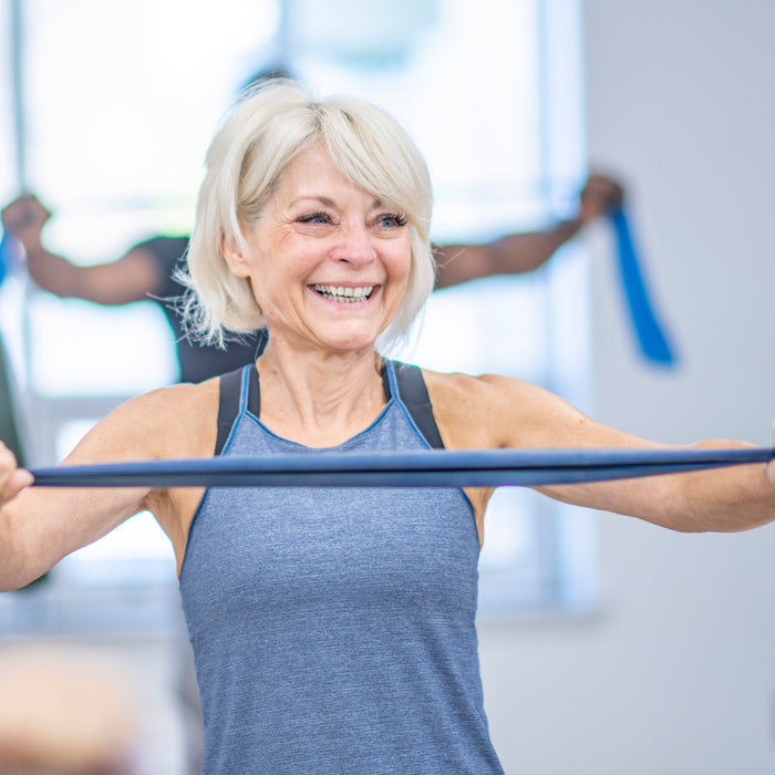 Women exercising in a class setting 