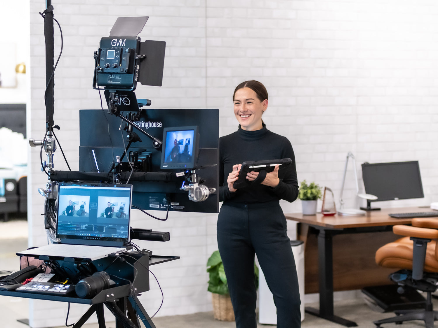 Brandi Healy Relax The Back Wellness Expert in front of a camera during a virtual appointment