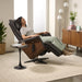 A woman using the Circa Zero Gravity Swivel Chair by Human Touch in espresso | Relax The Back